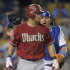 Los Angeles Dodgers catcher Rod Barajas, right, yells toward Arizona Diamondbacks' Gerardo Parra after Parra was hit with a pitch during the sixth inning of a baseball game, Wednesday, Sept. 14, 2011, in Los Angeles. (AP Photo/Mark J. Terrill)