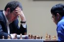 Israel's Boris Gelfand (L) plays against India's world chess champion Vishwanathan Anand