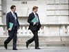 Britain's Chancellor of the Exchequer George Osborne and Chief Secretary to the Treasury Danny Alexander leave the Treasury for the House of Commons in London