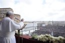 Pope Francis speaks during his "Urbi et Orbi" address from a balcony in St. Peter's Square at the Vatican