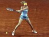 Sharapova of the Russia hits a return to Stephens of the U.S. during their women's singles match at the Rome Masters tennis tournament