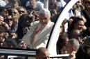 Pope Benedict XVI waves during his weekly audience at the Vatican, Wednesday, March 14, 2012. (AP Photo/Alessandra Tarantino)