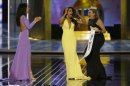 Miss New York Nina Davuluri, center, reacts after being named Miss America 2014 pageant as Miss California Crystal Lee, left, and Miss America 2013 Mallory Hagan celebrate with her, Sunday, Sept. 15, 2013, in Atlantic City, N.J. (AP Photo/Mel Evans)