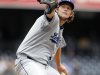 Los Angeles Dodgers' Clayton Kershaw delivers a pitch in the first inning of a baseball game against the San Diego Padres, Sunday, Sept. 25, 2011, in San Diego. (AP Photo/Chris Park)