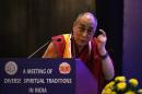 His Holiness Dalai Lama speaks during an inter-religious meeting for harmony in New Delhi on September 20, 2014