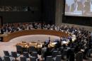 The United Nations Security Council votes to approve a resolution endorsing the planned halt in fighting in Syria at the United Nations Headquarters in New York