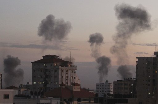 Smoke rises following Israeli air strikes in Gaza City