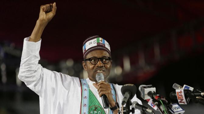 In this Wednesday, Dec. 10, 2014 photo, former military leader Muhammadu Buhari, a presidential aspirant, speaks during the Nigeria's leading opposition All Progressive Congress party convention in Lagos, Nigeria. (AP Photo/Sunday Alamba)