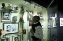 In a March 14, 2012 photo, David Pilgrim, the founder and curator who started building the Jim Crow Museum of Racist Memorabilia, adjusts a display at the museum in Big Rapids, Mich. The museum says it has amassed the nation's largest public collection of artifacts spanning the segregation era, from Reconstruction until the civil rights movement, and beyond. (AP Photo/Carlos Osorio)