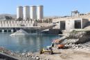 File photo of employees working at strengthening the Mosul Dam in northern Iraq
