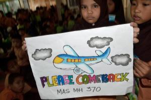 An Indonesian student displays a message expressing&nbsp;&hellip;