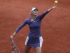 Russia's Maria Sharapova prepares to serve against Canada's Eugenie Bouchard in their second round match at the French Open tennis tournament, at Roland Garros stadium in Paris, Thursday, May 30, 2013. (AP Photo/Petr David Josek)