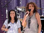 FILE - In this Sept. 1, 2009 file photo, singer Whitney Houston, right, sings with her daughter Bobbi Kristina Brown during a performance on 'Good Morning America' in Central Park in New York ...