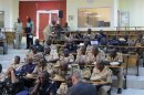 Military experts take part in a meeting to discuss the Mali crisis in Bamako