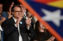 Catalonia's regional government president Artur Mas applauds during the Catalan independence coalition "Junts pel Si" party's final campaign meeting for the election in Barcelona, Spain, on September 25, 2015