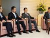 Japan's Prime Minister Abe talks with Finance Minister Aso, Economics Minister Amari, and Bank of Japan Governor Shirakawa in Tokyo