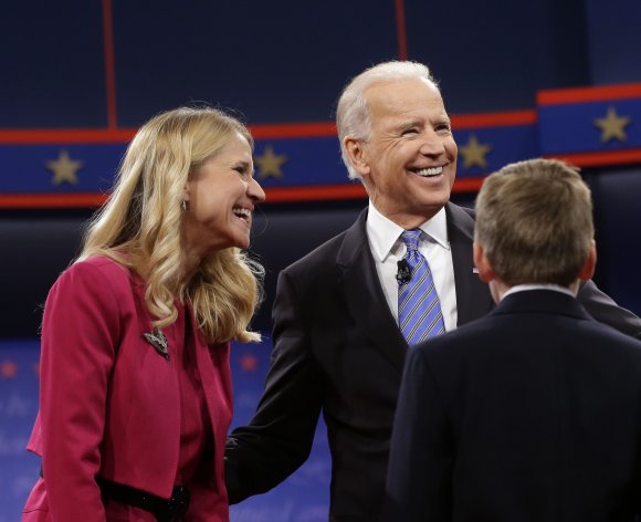 Vice President Joe Biden, right, with Janna Ryan, left, wife of Republican vice presidential candidate, Rep. Paul Ryan, R-Wis., after the vice presidential debate, at Centre College in Danville, Ky., Thursday, Oct. 11, 2012. (AP Photo/Pablo Martinez Monsivais)
