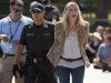 Actress Daryl Hannah is arrested by U.S. Park Police in front of the White House in Washington, Tuesday, Aug. 30, 2011, during a protest against the Keystone oil pipeline.  (AP Photo/Evan Vucci)