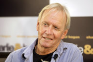FILE - In this Oct. 28, 2008 file photo Paul Hogan poses for a photo during a press conference for his movie "Charlie and Boots" at hotel in Sydney. The "Crocodile Dundee" star has resolved his seven-year battle with Australian tax authorities over alleged unpaid taxes dating back to his first international hit movie in the 1980s. Hogan and his friend and producer John Cornell said through their lawyer on Monday, April 30, 2012, the pair had reached a confidential settlement with tax authorities to resolve over 150 million Australian dollars ($156 million) in alleged unpaid taxes and penalties. (AP Photo/Rick Rycroft, File)