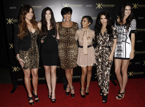 From left, Khloe Kardashian, Kylie Jenner, Kris Jenner, Kourtney Kardashian, Kim Kardashian, and Kendall Jenner pose together at the Kardashian Kollection launch party in Los Angeles, Wednesday, Aug. 17, 2011. The Kardashian Kollection designed by the Kardashian sisters is available at Sears. (AP Photo/Matt Sayles)