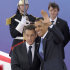 French President Nicholas Sarkozy greets President Barack Obama upon arriving at the G20 summit in Cannes, France, Thursday, Nov. 3, 2011. (AP Photo/Susan Walsh)