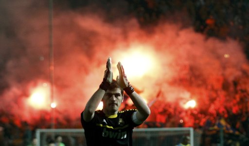 Real Madrid's Casillas celebrates after winning his Champions League quarter-final first leg soccer match against APOEL in Nicosia