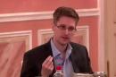 An image grab taken from a video released by Wikileaks on October 12, 2013 shows US intelligence leaker Edward Snowden speaking during a dinner with US ex-intelligence workers and activists in Moscow on October 9, 2013