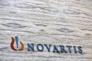 A Novartis logo is pictured on its headquarters building in Mumbai