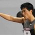 China's Liu Xiang gestures to the crowd before competing at 110m hurdles event at the 2012 Samsung Diamond League competition in Shangha