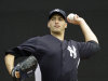 Andy Pettitte, who came out of retirement on a minor league contract to pitch for his former team, throws in the bullpen after arriving at the Yankees spring training facility at Steinbrenner Field in Tampa, Fla., Tuesday, March 20, 2012.  (AP Photo/Kathy Willens)