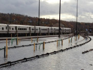 In a photo made available by the Metropolitan Transportation Authority, trains stand in a flooded Metro-North's Harmon Yard, Wednesday morning, Oct. 31, 2012, on the Hudson Line, in Croton-on-Hudson, New York in the aftermath of superstorm Sandy. (AP Photo/Metropolitan Transportation Authority)