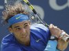 Rafael Nadal of Spain returns a shot to David Nalbandian of Argentina during the U.S. Open tennis tournament in New York, Sunday, Sept. 4, 2011. (AP Photo/Charlie Riedel)
