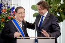 United Nations Secretary General Ban Ki-moon (L) is presented with a Dutch royal distinction by Dutch Foreign Minister Bert Koenders at the Catshuis in The Hague, The Netherlands, on April 19, 2016