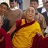 Tibetan spiritual leader the Dalai Lama, center, is helped by monks in descending stairs as he leaves a prayer session in Dharmsala, India, Monday, Sept. 26, 2011. (AP Photo/Ashwini Bhatia)