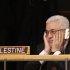 Palestinian President Mahmoud Abbas holds his hands to his face as U.S. President Barack Obama speaks during the 66th session of the General Assembly at United Nations headquarters Wednesday, Sept. 21, 2011.  (AP Photo/Seth Wenig)