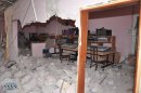 In this photo released by the Syrian official news agency, SANA, the damaged control room of Al-Ikhbariya TV station is seen after it was attacked by gunmen, in the town of Drousha, about 20 kilometers (14 miles) south of Damascus, Syria, Wednesday, June 27, 2012. Gunmen raided the headquarters of a pro-government Syrian TV station early Wednesday, demolishing the building and killing three employees, the state media reported. Syrian officials denounced what they called a rebel "massacre against the freedom of the press." (AP Photo/SANA)