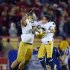 Notre Dame linebacker Manti Te'o, left, celebrates with wide receiver Robby Toma in the closing seconda of an NCAA college football game against Southern California, Saturday, Nov. 24, 2012, in Los Angeles. Notre Dame won 22-13. (AP Photo/Mark J. Terrill)