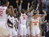 Ohio State players celebrate a 3-point shot against Arizona by LaQuinton Ross (10) during the second half of a West Regional semifinal in the NCAA men's college basketball tournament, Thursday, March 28, 2013, in Los Angeles. (AP Photo/Jae C. Hong)
