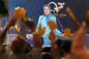 Maryam Rajavi, the leader of the National Council of Resistance of Iran, addresses thousands of exiled Iranians in Villepinte, north of Paris, Friday June 27, 2014. (AP Photo/Rermy de la Mauviniere)