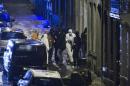 Belgian police block a road in central city of Verviers where Belgian counter-terrorist police raided an apartment