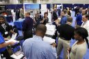 Jobseekers talk with recruiters at a Hire Our Heroes job fair in Washington