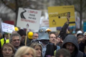 A protester wearing a pigeon mask takes part in a protest&nbsp;&hellip;