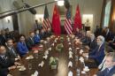US President Barack Obama(Center-R) meets with top Chinese officials at the conclusion of the seventh meeting of the US - China Strategic and Economic Dialogue in the Cabinet Room of the White House in Washington, DC, June 24, 2015