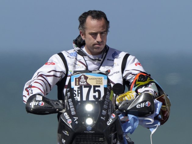 Argentina's Jorge Martinez Boero rides his Beta on the podium during the symbolic start of the 2012 Dakar Rally in Mar del Plata, some 400 Km south of Buenos Aires, on December 31, 2011. Martinez Boero died on January 1, 2012 in an accident during the first stage of the Rally. AFP PHOTO/JUAN MABROMATA (Photo credit should read JUAN MABROMATA/AFP/Getty Images)