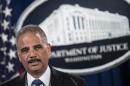 US Attorney General Eric Holder speaks during a press conference at the Department of Justice September 4, 2014 in Washington