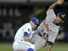 Detroit Tigers' Austin Jackson (14) beats the tag by Kansas City Royals second baseman Johnny Giavotella to steal second during the first inning of a baseball game on Wednesday, Sept. 21, 2011, in Kansas City, Mo. (AP Photo/Charlie Riedel)