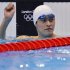 China's Sun Yang celebrates his first place finish in heat 4 of the men's 1500m freestyle event during the London 2012 Olympic Games at the Aquatics Centre