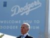 Los Angeles Dodgers owner Frank McCourt listens at a news conference about increased security at Dodger Stadium in Los Angeles