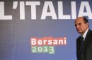Italian PD (Democratic Party) leader Pier Luigi Bersani leaves at the end of a news conference in Rome
