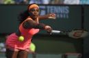 Serena Williams returns to Zarina Diyas, of Kazakhstan, during their match at the BNP Paribas Open tennis tournament, Sunday, March 15, 2015, in Indian Wells, Calif. (AP Photo/Mark J. Terrill)